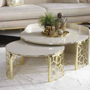 "Elegant Florence coffee table in gold and cream, featuring a luxurious design with a sleek gold frame and a sophisticated cream top, perfect for adding a touch of class to any living space."