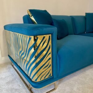 teal blue and gold sofa