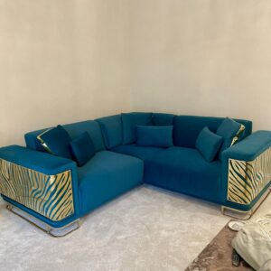 teal blue and gold sofa