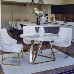 Elegant round marble table with luxurious gold legs, perfect for sophisticated interior design." This description is detailed, incorporates relevant keywords, and describes the item's appearance and potential use or appeal, which could help improve its visibility in search engine results.