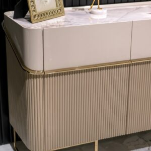 Elegant Cannes Sideboard in a Dining Room: Showcasing riveted beige doors and large cream drawers, this sideboard features a blush marble top, adding a sophisticated touch to the dining room decor.