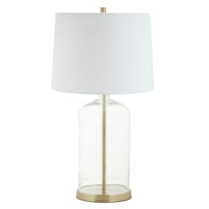 The Neo table lamp features a mix of clear glass and metal which brings a soft industrial appeal to the living area. Supported by a brass finish pedestal base that is encased in a glass frame, this table lamp is topped with a white fabric shade. Length: 35 cm Height: 65 cm Width: 35 cm