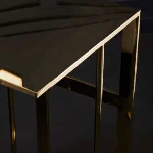 The Selene Gold C-Shaped Side Table adds an instant touch of luxury to any decor. Featuring a sleek, all-metal construction with a brilliant gold finish, this contemporary C-shaped table is both functional and stylish. Perfect for enhancing modern living rooms, bedrooms, or as an elegant accent next to your sofa. Features and Benefits: Elegant gold finish for a luxurious look C-shaped design for versatility and modern appeal Durable all-metal construction for lasting style Ideal for living rooms, bedrooms, or as a sofa-side accent