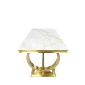 This luxury dining table features an open circle-accented trestle base built from stainless steel with a brushed gold finish, topped with stunning marble or ceramic in various colour options. The base frame showcases the uncluttered lines with the smooth marble top reflecting simplicity. Marble Colours: Grey / Mixed Brown & Beige / Black / White / Cream Ceramics:  Gold / Grey