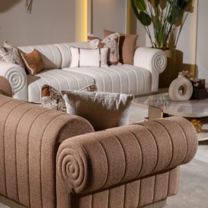 Handcrafted Belize luxury chesterfield-style sofa, bespoke-made with exquisite attention to detail. Plush, deep-buttoned upholstery in rich, sumptuous fabric. Elegant scrolled arms and intricate tufting enhance its timeless charm. Crafted for opulent comfort and enduring sophistication.