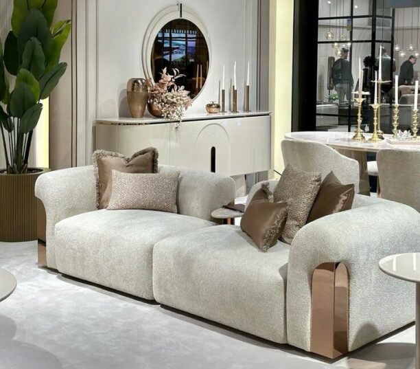 Explore the Aurelia Collection – where modern elegance shines through rose gold accents, blush watercolour table tops, and luxurious ivory boucle fabrics. Customize sofas and chairs in your choice of colors to create a space that's uniquely yours.