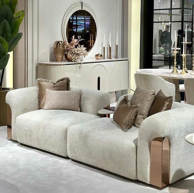 Explore the Aurelia Collection – where modern elegance shines through rose gold accents, blush watercolour table tops, and luxurious ivory boucle fabrics. Customize sofas and chairs in your choice of colors to create a space that's uniquely yours.