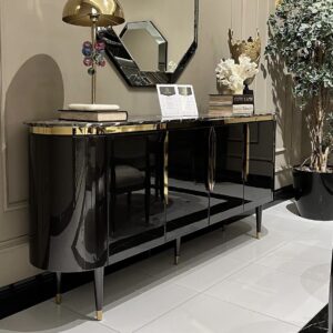 Perfect for hosting elegant dinner parties and lavish gatherings, the Athena table is an impressive 2.4 metres long seating 8-10 people. This bespoke-made table is crafted from a solid wooden core finished in a high shine latte or black gloss and detailed in gold or chrome metal.