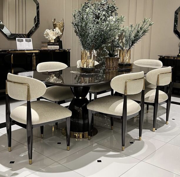 Perfect for hosting elegant dinner parties and lavish gatherings, the Athena table is an impressive 2.4 metres long seating 8-10 people. This bespoke-made table is crafted from a solid wooden core finished in a high shine latte or black gloss and detailed in gold or chrome metal.