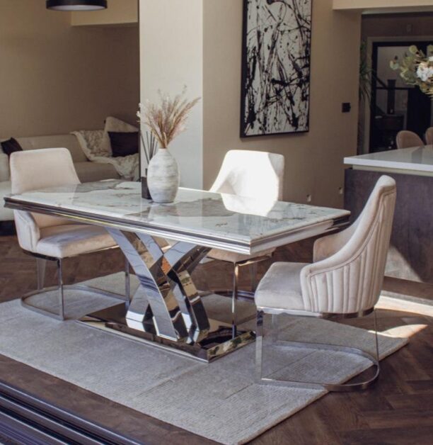 Elevate your dining room with the Roma Dining Table’s 1.8-meter top in luxurious marble, sintered stone, or glass. Features a polished stainless steel X-leg base for a modern touch