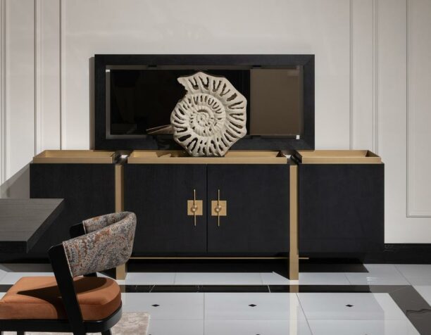 Elevate your living space with the Pierre Luxury Sideboard - a 2.4m bespoke masterpiece available in black wood and brushed gold detailing. This opulent piece features four spacious cupboards for practical storage, adorned with intricate metal handles for a touch of elegance.