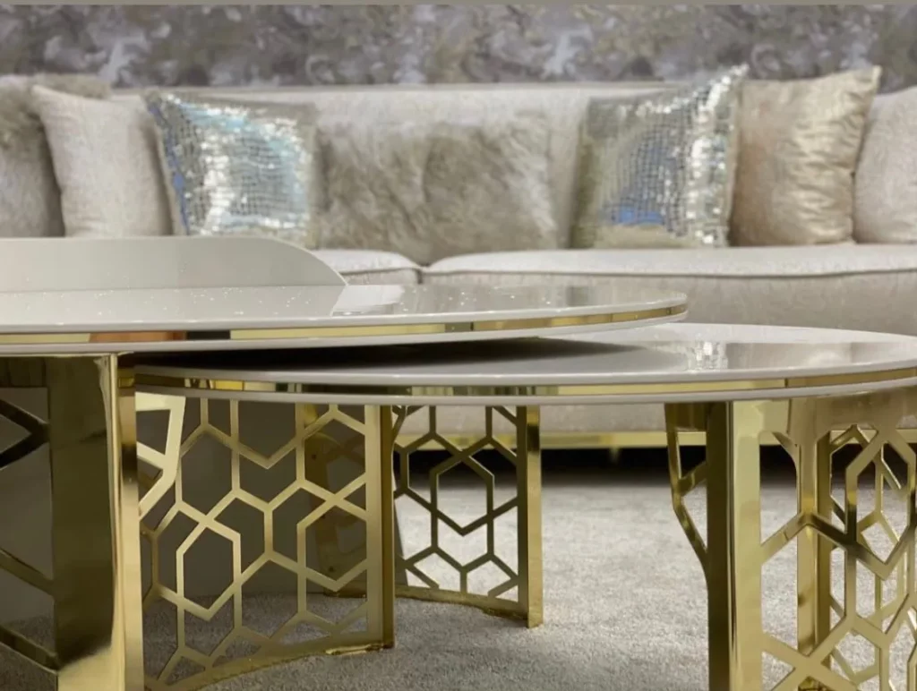 Elegant Florence coffee table in gold and cream, featuring a luxurious design with a sleek gold frame and a sophisticated cream top, perfect for adding a touch of class to any living space.