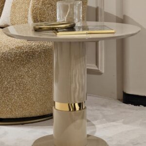 A bespoke accent table featuring a luxurious beige top complemented by elegant gold legs, perfect for adding a touch of sophistication to any room.