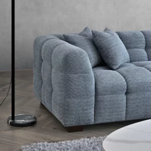 Liberty Bubble Corner Sofa with deep channel stitching and iron boucle fabric, showcasing a blend of contemporary design and classic comfort.