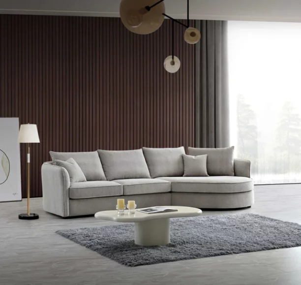 Serenity sofa in chic bouclé fabric with a curved design, blending durability and comfort for modern living spaces.