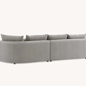 Serenity sofa in chic bouclé fabric with a curved design, blending durability and comfort for modern living spaces.