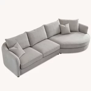 Serenity sofa in chic bouclé fabric with a curved design, blending durability and comfort for modern living spaces.