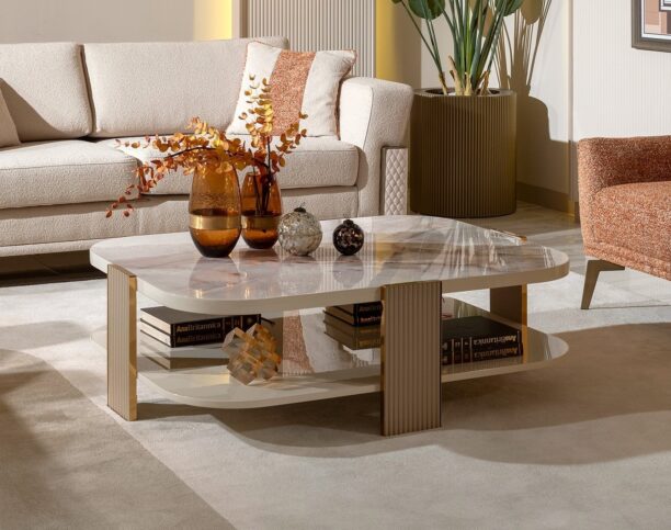 Elevate your living space with the Belize Luxury Marble Coffee Table, featuring a stunning cream and blush marble effect surface complemented by gold or chrome detailing. This exquisite piece exudes timeless elegance and is meticulously hand-crafted by our experts. A true statement of luxury, the Belize coffee table is perfect for adding sophistication to any interior. Features and Benefits: Cream and blush marble effect surface for a luxurious touch Available with gold or chrome detailing Hand-crafted by experts with meticulous attention to detail Dimensions: 120cm x 50cm Takes up to 6 weeks for manufacture