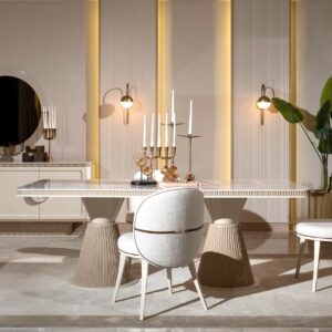 Bespoke Belize dining set featuring a cream and beige color scheme with a blush marble top. The set includes custom cream dining chairs, meticulously crafted for timeless elegance and luxurious dining experiences.