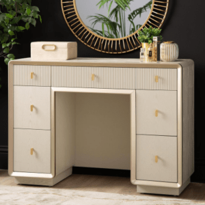 The Amelie Cream Elm 7 Drawer Dressing Table is a stylish furniture piece crafted from wood and finished with a serene cream veneer.