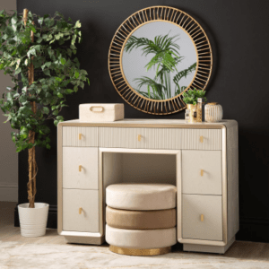 The Amelie Cream Elm 7 Drawer Dressing Table is a stylish furniture piece crafted from wood and finished with a serene cream veneer.