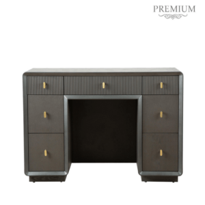 The Amelie Smoke Grey Elm 7 Drawer Dressing Table is a chic furniture piece made of MDF with a sleek veneer finish in an alluring grey tone. This elegant table boasts seven drawers, offering ample storage while exuding modern sophistication, perfect for enhancing any dressing or bedroom space with both style and functionality