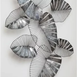 The Zania leaf wall art adds a metallic accent to contemporary interiors. Its leaves are made from a combination of recycled metal and steel wire. The juxtaposition between both materials accentuates the design. The reflective silver finish highlights the intricate detail inherent in nature. Display it in the living room or hallway.