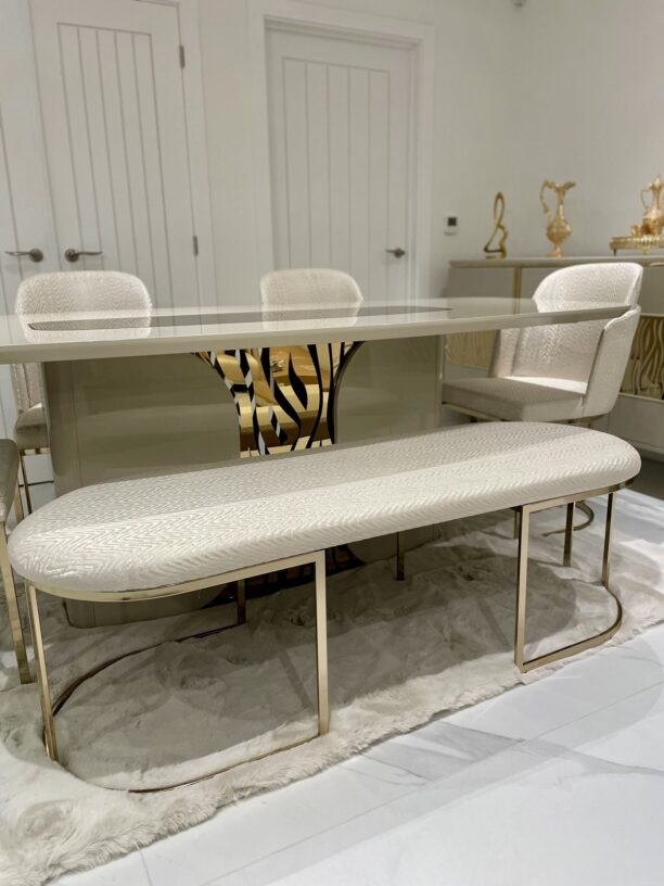 cream and gold dining set with bench