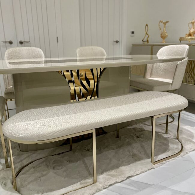 cream and gold dining set with bench