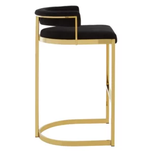 Elevate your bar area with the Piermont Bar Stool, boasting a luxurious black and gold color scheme. Inspired by the opulence of art deco design, its curved backrest and u-shaped base exude glamour. Wrapped in sumptuous velvet, the seat and backrest offer both style and comfort. Add a touch of sophistication to your space with the Piermont Bar Stool today