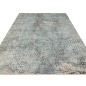 The Blake Rug brings celestial charm to your living space, marrying high-quality craftsmanship with luxurious comfort. Expertly crafted, its captivating design reminiscent of a Basquiat painting adds an artistic touch to your floor. With muted hues of blue, cream, and brown, it seamlessly complements contemporary settings while also enhancing traditional spaces like living rooms and bedrooms.