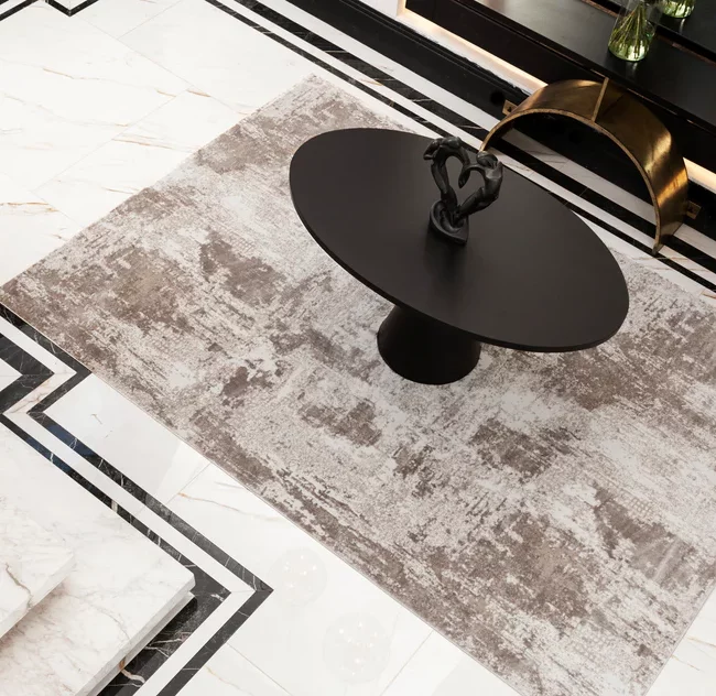 Transform your living space with the allure of the outdoors with our Ellie Rug. Adorned with serene shades of brown and white and an ethereal design, this abstract rug effortlessly evokes a sense of tranquil bliss, perfect for unwinding or infusing your home with a touch of natural elegance.