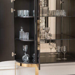 Luxury Cabinet with glossy dark finish, gold accents, and glass shelves, offering elegant and practical storage for sophisticated living spaces.