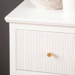 White Windsor 6-Drawer Chest Cabinet with ribbed texture on drawers and gold handles, offering ample storage and a contemporary design