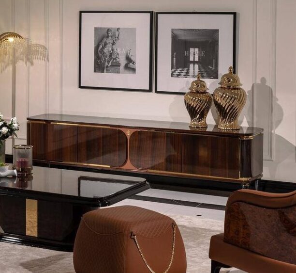 Front view of the Nevada TV Unit, a luxury piece from the Nevada Collection, featuring a dark wood finish with gold accents, sleek lines, and bespoke craftsmanship.