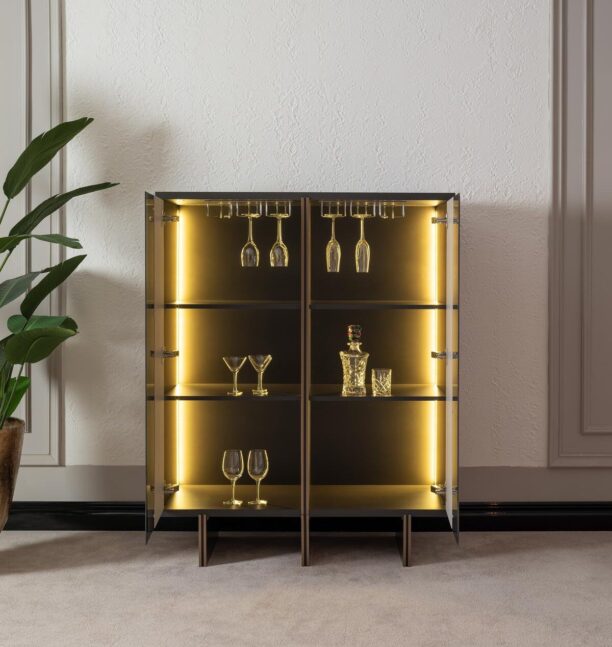 Discover the Aurora Bar Cabinet—a made-to-order luxury wooden cabinet featuring a glass front and integrated LED lighting. Perfect for showcasing your finest glassware in style.