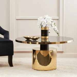 The Alessia Black Marble Coffee Table brings feminine elegance and luxury to any living space. Its stunning black marbled glass top is beautifully complemented by a gold-finished base and accents. The balance between the sleek black column and warm gold tones creates a timeless and sophisticated design, perfect for modern interiors.