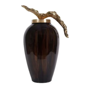 Make a bold statement with the Arlo Grande Decorative Jar, a stunning piece that beautifully blends rich chocolate and ebony tones. Its luxurious glazed finish is perfectly complemented by an elegant gold lid, creating a sophisticated focal point for any console or shelf.