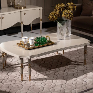 Introduce an element of elegance to your living space with the Riviera Coffee Table, a beautifully crafted piece measuring 1.4 meters by 80 cm. This coffee table is designed to be the centerpiece of any room, featuring intricate leg designs that showcase unparalleled craftsmanship. Available in bespoke finishes, you can choose between a classic black or a timeless cream, each complemented by either gold or chrome accents to match your style. The Riviera Coffee Table is more than just a table; it’s a statement of luxury and sophistication.