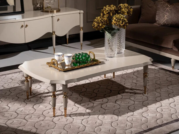 Introduce an element of elegance to your living space with the Riviera Coffee Table, a beautifully crafted piece measuring 1.4 meters by 80 cm. This coffee table is designed to be the centerpiece of any room, featuring intricate leg designs that showcase unparalleled craftsmanship. Available in bespoke finishes, you can choose between a classic black or a timeless cream, each complemented by either gold or chrome accents to match your style. The Riviera Coffee Table is more than just a table; it’s a statement of luxury and sophistication.