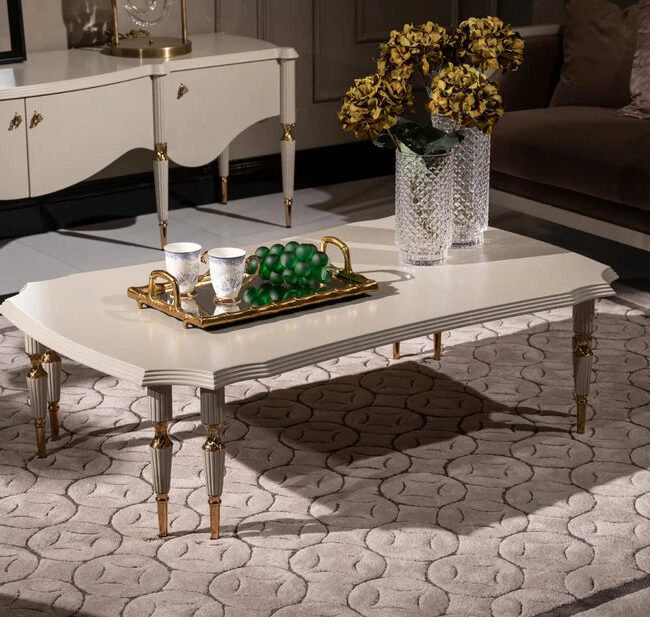 Introduce an element of elegance to your living space with the Riviera Coffee Table, a beautifully crafted piece measuring 1.4 meters by 80 cm. This coffee table is designed to be the centerpiece of any room, featuring intricate leg designs that showcase unparalleled craftsmanship. Available in bespoke finishes, you can choose between a classic black or a timeless cream, each complemented by either gold or chrome accents to match your style. The Riviera Coffee Table is more than just a table; it’s a statement of luxury and sophistication.