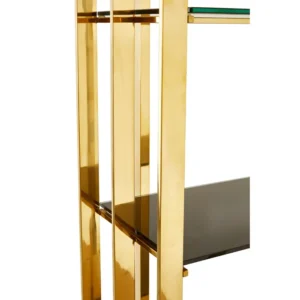 The Elysium Rectangular Bookshelf features a luxurious gold stainless steel frame paired with five sleek black tempered glass shelves, creating a striking and contemporary look. Its clean lines and elegant design make it a perfect addition to any modern space. Coordinate the Elysium bookshelf with reflective metallic accessories and lighting for a cohesive, sophisticated style.