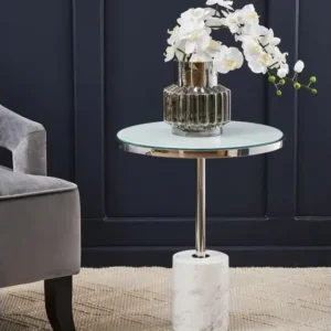 Elevate your space with the Verona White Marble & Chrome End Table. Featuring a round marble top and chrome pedestal base for a modern luxe look.