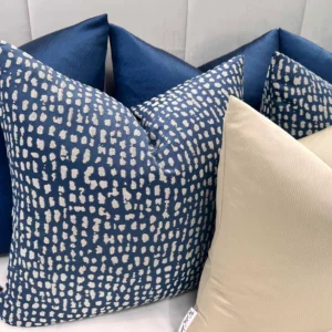 Elevate your home with the Navy and Gold Luxe Cushion Set. Bespoke handmade luxury cushions with navy and gold tones, available with feather inserts.