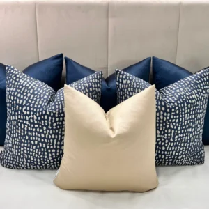 Elevate your home with the Navy and Gold Luxe Cushion Set. Bespoke handmade luxury cushions with navy and gold tones, available with feather inserts.