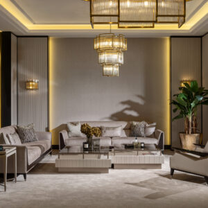 Sensatori Luxury Sofa with dark wood accents and plush beige upholstery, featuring bespoke design options in a variety of fabrics and finishes.