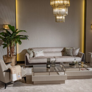 Sensatori Luxury Sofa with dark wood accents and plush beige upholstery, featuring bespoke design options in a variety of fabrics and finishes.