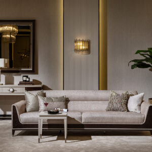 Sensatori Luxury Sofa with dark wood accents and plush beige upholstery, featuring bespoke design options in a variety of fabrics and finishes.