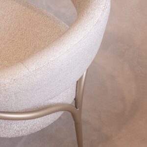 Bellina dining table with cream gloss finish and curved design, paired with bespoke boucle fabric chairs