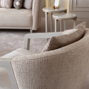 Luxurious Lusso sofa bespoke-made with an elegant cream wooden frame, featuring plush upholstery and refined craftsmanship, designed to elevate any sophisticated living space.